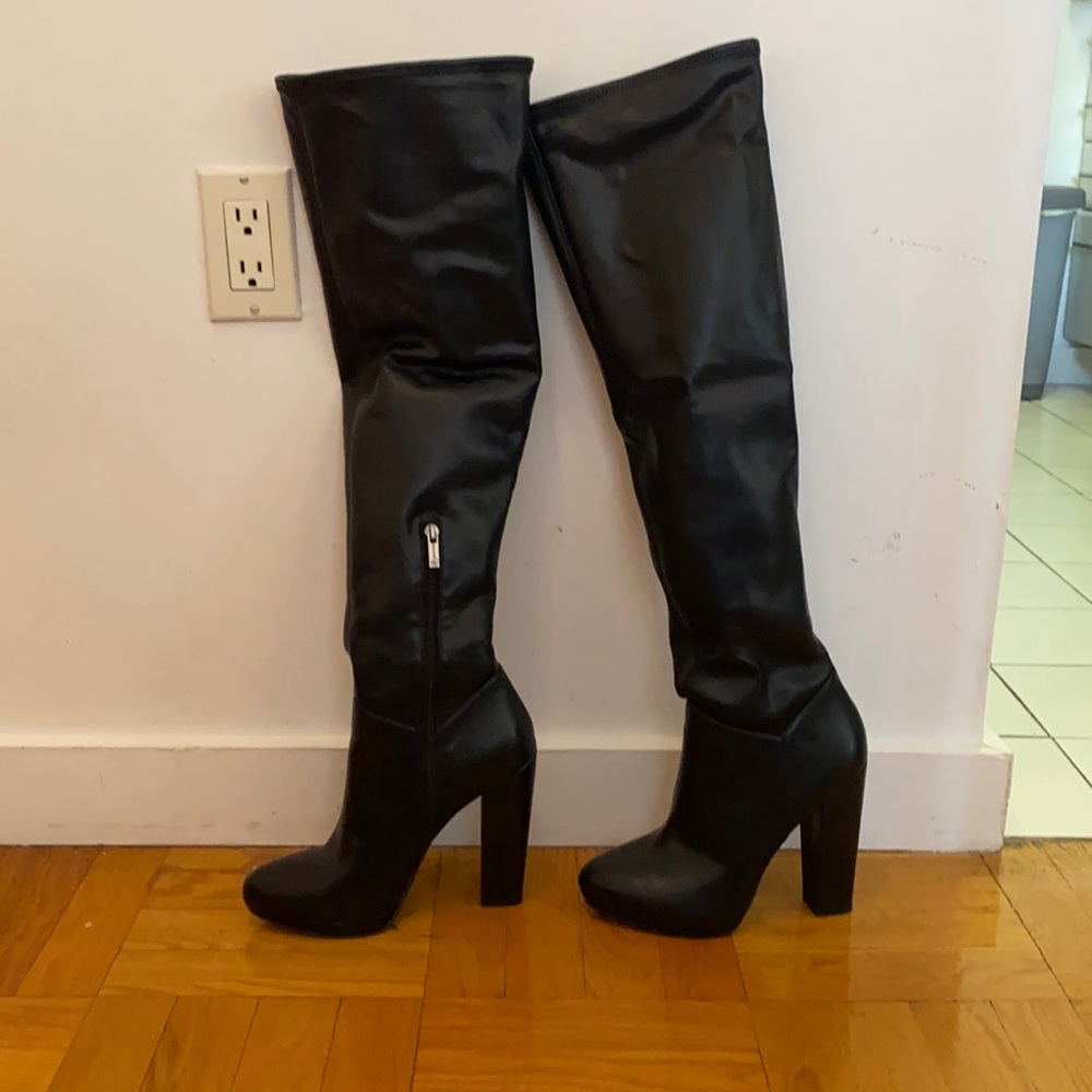 Never worn. Over the knee faux leather boots